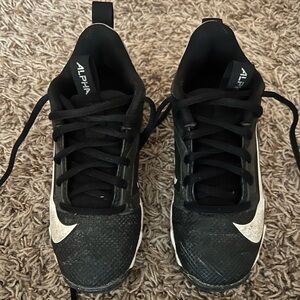 Black and white football cleats.